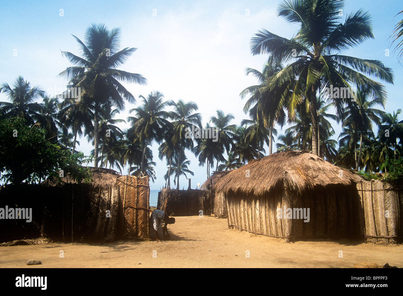 Fishermen`s houses made from woven coconut palm fronds in Winneba